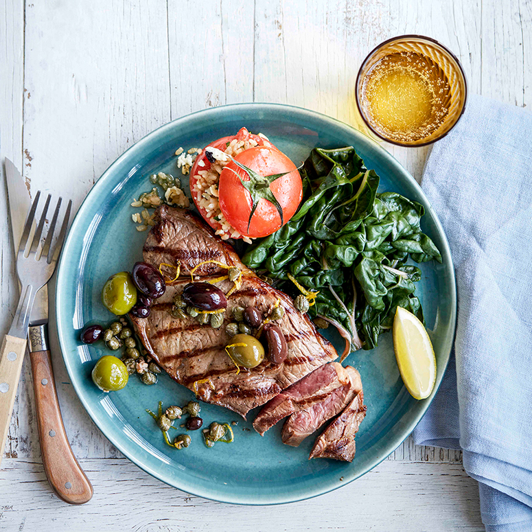 Char-grilled rump steak with mixed olive sauce