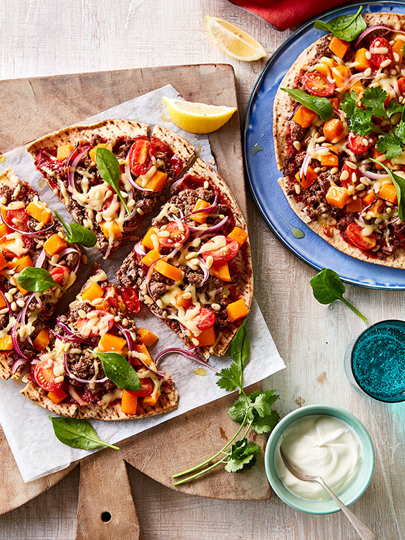 Middle Eastern beef and pine nut pizzas