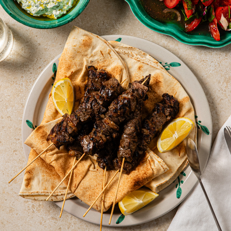 Beef Kebabs with Feta Tzatziki, Tomato Sumac Salad