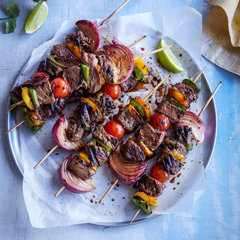 Black pepper beef kebabs with rice noodle salad