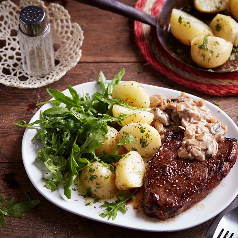 Rump steak with mushroom sauce and baby potatoes