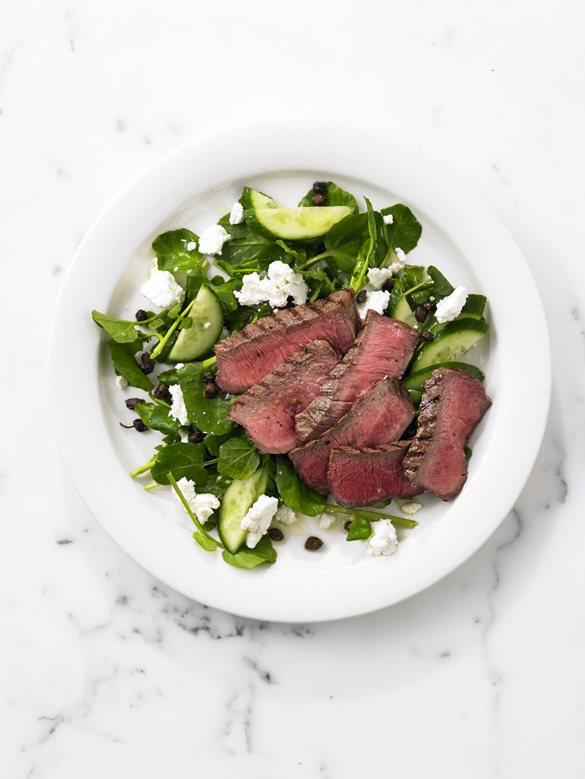 Char-grilled flat iron steak with feta and capers
