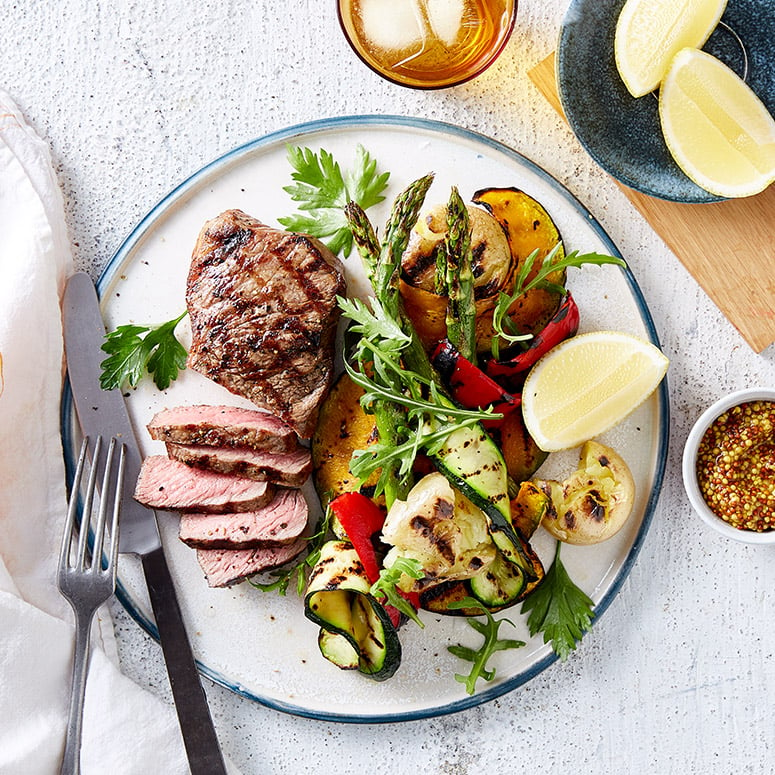 Char-grilled steak with crushed potatoes