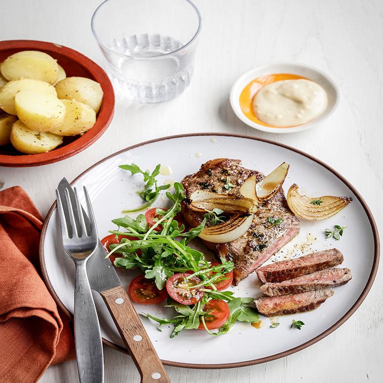 Garlic and thyme strip loin steaks